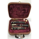 A 1970's cased clarinet, by Corton, complete with accessories