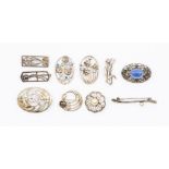 Ten silver brooches - Mackintosh style; Scandinavian brooch stamped K&SH; gem-set etc, gross