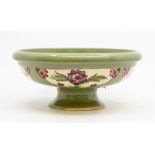 A Moorcroft Persian pattern pedestal bowl, circa 1918, celadon ground, W. Moorcroft green signature,