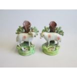 A pair of Staffordshire Sheep and Lamb Tree Spill groups Date  circa 1830 Size 15cm high  9cm diam