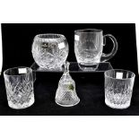 A collection of glass wares, including Waterford decanter and bell, a pressed glass square decanter,
