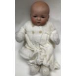 Armand Marseille 15 inch baby doll, bisque head, composition body. (Split to top of body), along