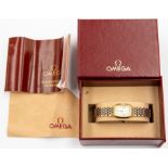 A ladies Omega DeVille stainless steel and gold-plated wristwatch, rectangular dial with Roman