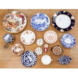A collection of Royal Crown Derby china wares mostly plates including two 1128 pattern pin dishes,