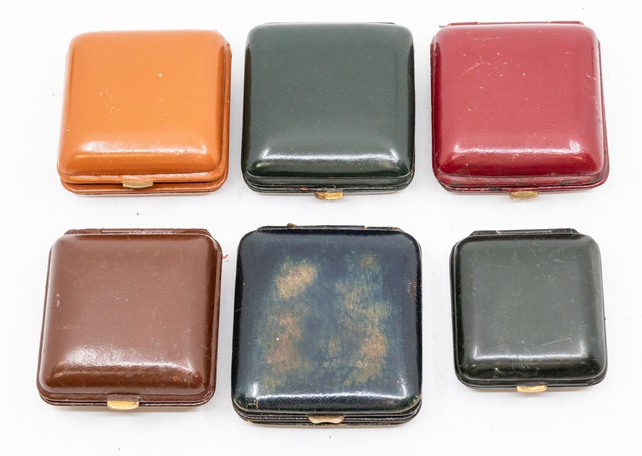 Six small leather cased travel clocks, the Swiss eight day movements in square cases, varying - Image 2 of 2