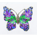 A silver plique a jour silver butterfly brooch/pendant, the purple, le and green enamel winds
