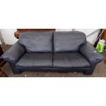 A contemporary black leather three piece suite, comprising two seater settee and two armchairs,
