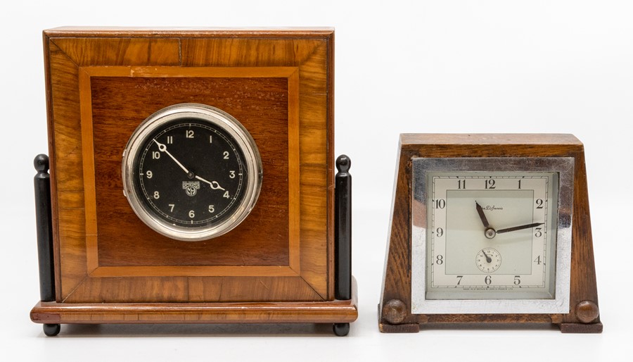 Four British art deco style desk or mantel clocks, the first by Smiths in cross-banded mahogany