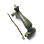 Roman Bronze Brooch 2nd century AD, 32.59 mm. A Roman Knee type brooch with a tubular head that