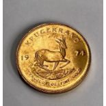 A 1974 22ct gold South African Krugerrand, 34 grams approx