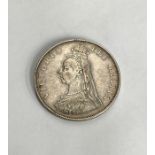 Victoria 1887 double florin. Condition. Wear to high points with small scratches to surface.