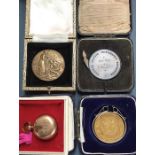 Gold plated Single Sovereign case, with a gold plated 1972 Crown, with two Bronze medals.