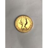 Elizabeth II 1963 full Sovereign. Condition, slight wear to high points with very small scratches to