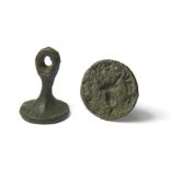 Medieval Seal.  Circa 14th century. Copper-alloy, 17.24 mm. A small medieval chess-piece type seal