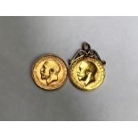 Sovereigns 1911 & 1914 (with yellow metal mount, approx 8.4g total for coin and mount)  Condition,