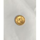 Edward VII 1910 full Sovereign. Condition, wear to high points with small scratches to  surface.