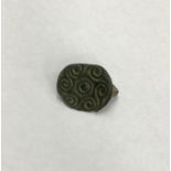 An incomplete cast copper-alloy Early Anglo-Saxon/Early Medieval brooch of saucer type, probably