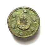Roman Disk Brooch.  Circa 2nd century AD. Copper-alloy, 5.67 grams. 21.17 mm. A tinned bronze disk