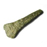 Bronze Age Votive Axe. Circa .2150 - 1500 BC. Bronze, 4.47 grams. 35.38 mm. A miniature Bronze Age