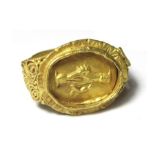 Roman Gold Clasped-Hands Ring. Circa 4th century AD. Gold, 4.87 grams. 20.18 mm, internal 15.51