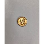 George V, 1912 Sovereign. Condition, slight wear to high points with small scratches to surface.