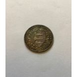 Norfolk & Suffolk Silver Shilling token for J Hunton’s Yarmouth & AT Blyth & Co, Bury. Condition.