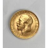 A George V 1914 22ct gold full sovereign, 8 grams approx  Condition, slight wear to high points with
