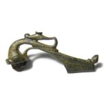 Romano-British Trumpet Brooch.  Circa 1st - 2nd century AD. Copper-alloy, 15.68 grams. 55.37 mm. A