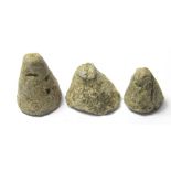 Viking Gaming Pieces. Circa 9th-10th century AD. Lead, 15.04 - 21.46 mm. A group of three Viking