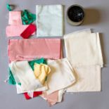 A bag of remits linings to include various shades of pale green, rose pink and cream. A vintage