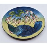 A Moorcroft Tui plate designed by Philip Gibson, date: 9/5/03, 22.5cm diam Condition Report: