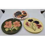 Moorcroft: 3 Moorcroft year plates 1986 'Hibiscus' pattern, no 106/250, 1987 'Freesia' pattern, no