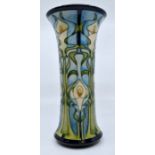 Moorcroft: A Moorcroft 'Calla Lily' trumpet vase by Emma Bossons. Height approx 26cm. Marks to base.