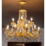 ****** ITEM LOCATION BISHTON HALL**********  A gilt metal fifteen light pendant electrolier with cut