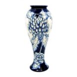 Moorcroft 'Bubbles ' slender baluster vase in blue & white. Moorcroft Collectors Club (MCC) 93