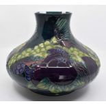 A Moorcroft Finch Teal squat vase designed by Sally Tuffin, circa 1990, approx 8 x 10" Condition
