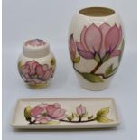 Moorcroft: A group of Moorcroft 'Pink Magnolia' pattern items comprising vase, small ginger jar