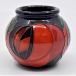A Moorcroft Red rose vase designed by Emma Bossons, approx 2" high Condition Report: good no