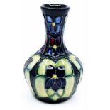 A Moorcroft Violet vase, silver line, designed by Sally Tuffin, approx 5"  Condition Report: good no