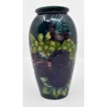 A Moorcroft Finch Teal vase designed by Sally Tuffin, circa 1990, approx 7.5" high  Condition