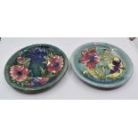 Two Moorcroft plates designed by Walter Moorcroft - Hibiscus with Bud and Anemone Teal, dates 1950