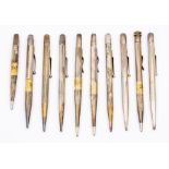 A collection of 10 silver engine turned propelling pencils mainly Fyne Poynt, some stamped