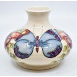 Moorcroft: A Moorcroft Collectors Club 'Butterfly' vase. Height approx 11cm. Marks to base.