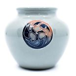 A Moorcroft small disc pattern vase, approx 3" high Condition Report: small faint hairline to body
