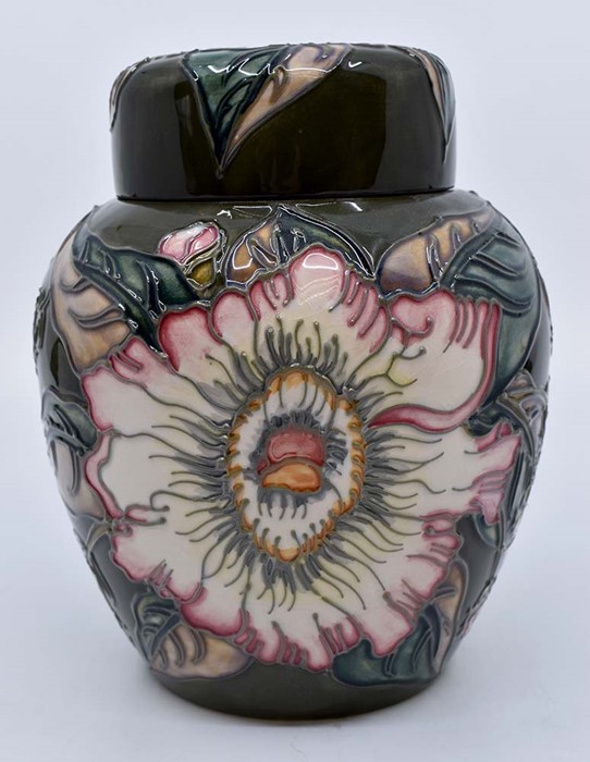 Moorcroft: A Moorcroft 'Gustavia' pattern ginger jar. Height approx 15.5cm. Marks to base.