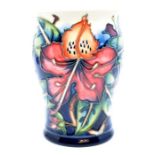 Moorcroft: A Moorcroft 'Simeon' pattern vase. Height approx 13.5cm. Marked to the base. Condition: