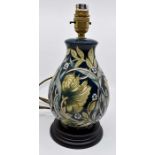 A Moorcroft Pimpernel lamp base designed by Nicola Slaney, circa 2014, part of Three Williams