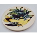 A Moorcroft Golden Oriole plate designed by Philip Gibson, date trial 31/10/02, 22.5cm diam.