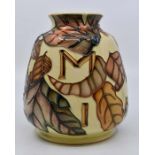 Moorcroft: A Moorcroft Collectors Club 'Millenium Fall' vase. Height approx 14.5cm. Marks to the