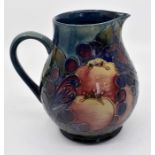 A Moorcroft Finch blue jug designed by Sally Tuffin, circa 1992, approx 6" high Condition Report: